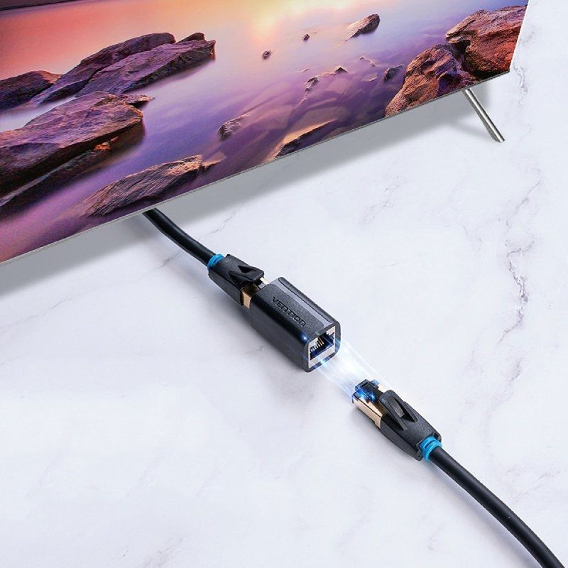 Adaptador Vention RJ45 Conector IPWB0 Cat.7 FTP / RJ45 Fêmea - RJ45 Fêmea / Preto